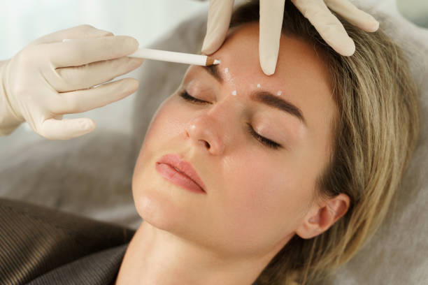 A woman receiving a facial treatment to rejuvenate and nourish her skin.