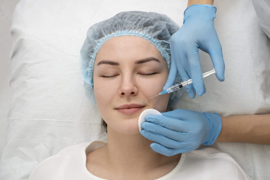 Patient receiving a Botox injection from a gloved provider