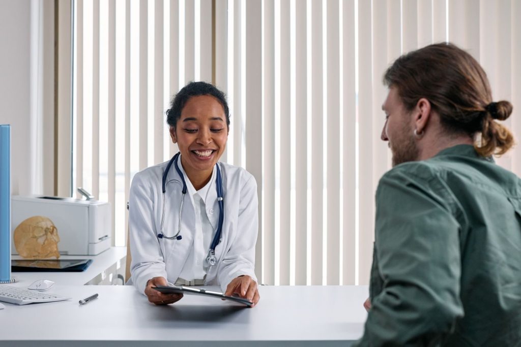 Doctor discussing GLP-1 weight loss medication options with a patient
