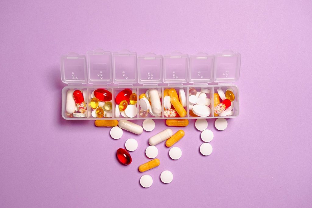 Weekly pill organizer with medications for psychiatric medication management