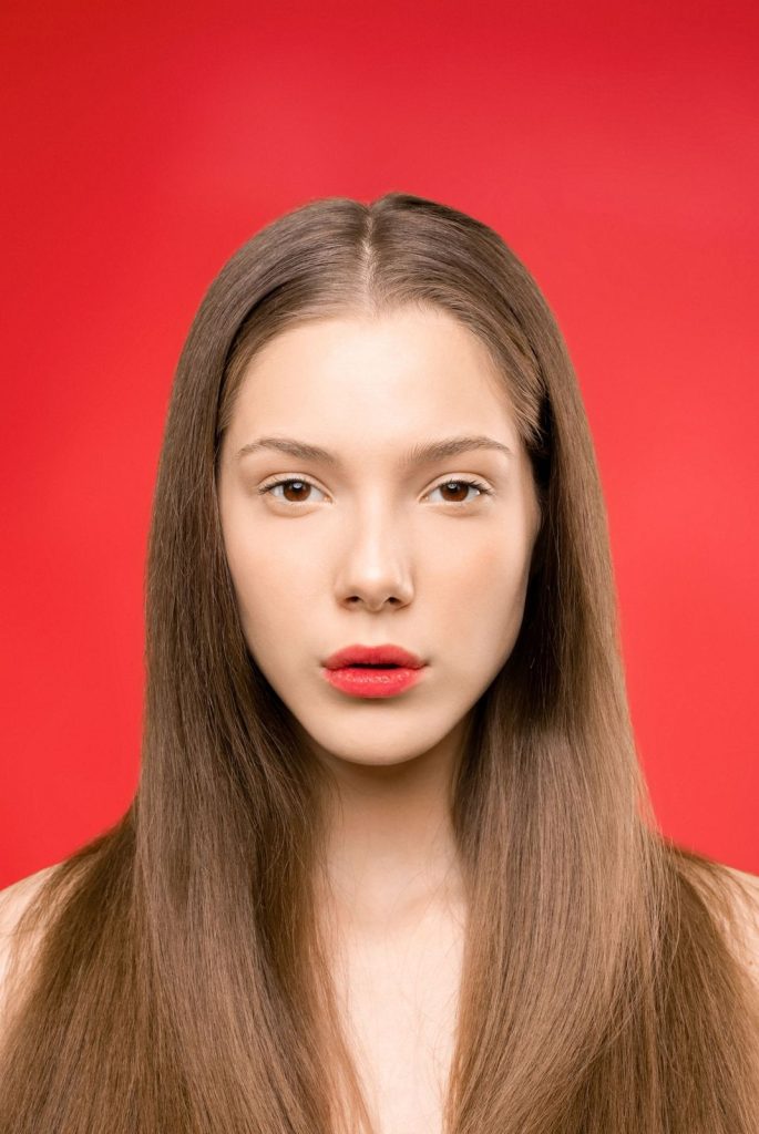 Portrait of a woman with smooth, natural-looking skin considering Botox or fillers