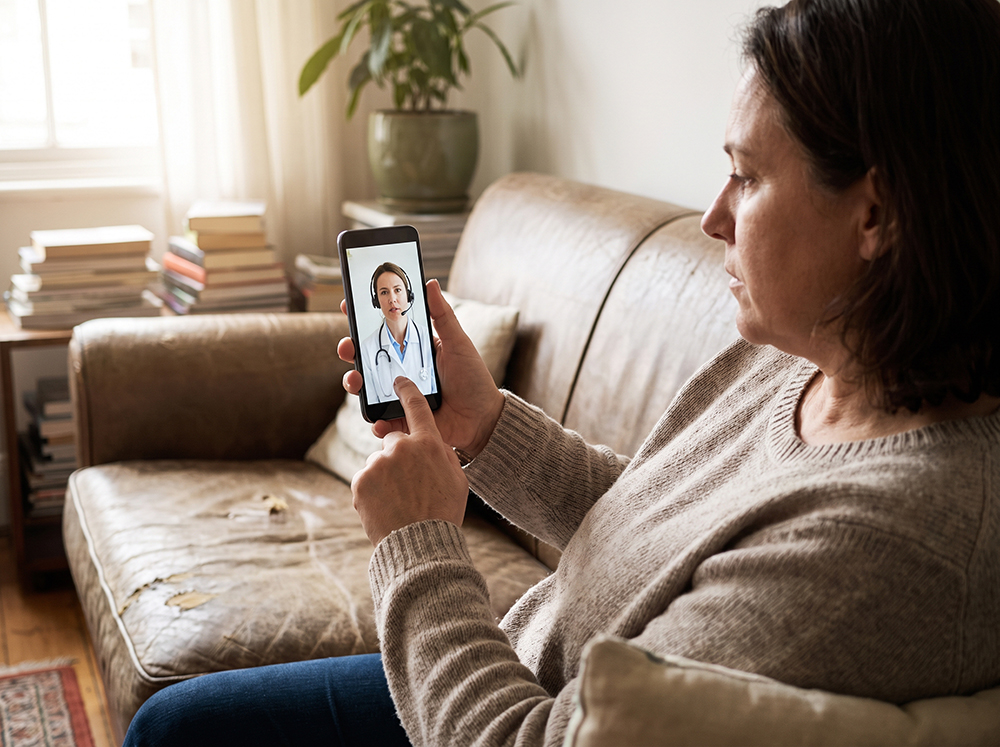 patient having a televisit appointment with a doctor online